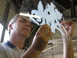 Terry Vick checks etched glass. "F-1