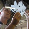Glass Graphics; Studio F-1 ; 770-426-4922
Custom Etched glass, Table Tops, Mirrors.  
http://www.glassgraphics.net/